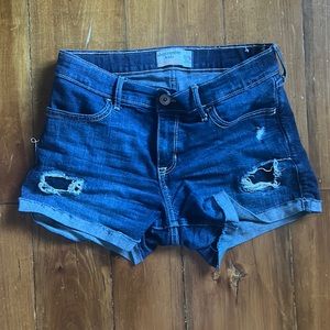 Navy blue ripped jean shorts